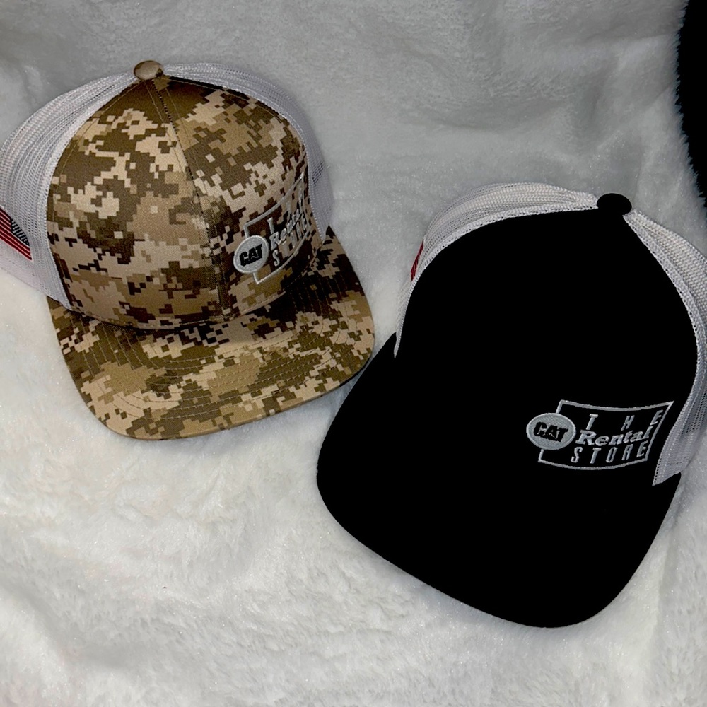 Two Snap back Cat Rental hats